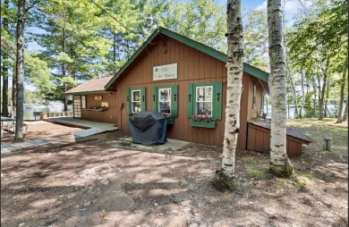Lovely 4 bedroom 2 bath home built in 2000. Home features an on Michaywe Pines Course in Michigan - for sale on GolfHomes.com, golf home, golf lot