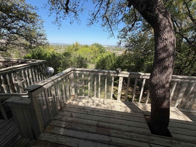 Are you looking for the perfect fixer-upper? This is the one! on Slick Rock Golf Course - Horseshoe Bay in Texas - for sale on GolfHomes.com, golf home, golf lot