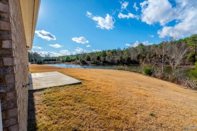 FULL BRICK HOUSE WITH WATER ACCESS IN BACKYARD.   SURROUNDED BY on Cherokee Ridge Country Club in Alabama - for sale on GolfHomes.com, golf home, golf lot