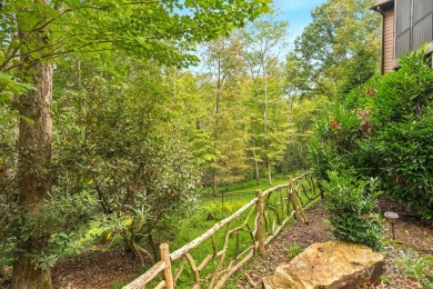 Discover Luxury Mountain Living at 23 Dividing Ridge. Step into on The Cliffs At Walnut Cove in North Carolina - for sale on GolfHomes.com, golf home, golf lot