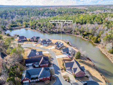 FULL BRICK HOUSE WITH WATER ACCESS IN BACKYARD.   SURROUNDED BY on Cherokee Ridge Country Club in Alabama - for sale on GolfHomes.com, golf home, golf lot