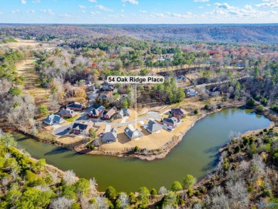 FULL BRICK HOUSE WITH WATER ACCESS IN BACKYARD.   SURROUNDED BY on Cherokee Ridge Country Club in Alabama - for sale on GolfHomes.com, golf home, golf lot