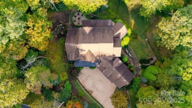 Discover Luxury Mountain Living at 23 Dividing Ridge. Step into on The Cliffs At Walnut Cove in North Carolina - for sale on GolfHomes.com, golf home, golf lot