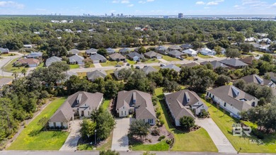 The Beautiful Oak lined streets of The Peninsula a gated on Peninsula Golf and Racquet Club in Alabama - for sale on GolfHomes.com, golf home, golf lot