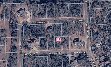 Nestled along a quiet, tree-lined street, this prime homesite on Rock Creek Golf Club in Texas - for sale on GolfHomes.com, golf home, golf lot