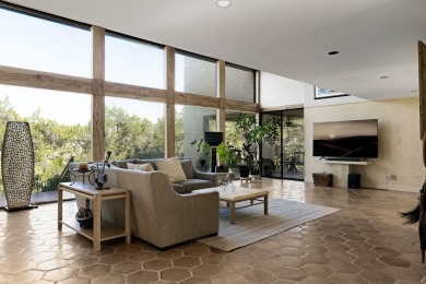 A stunning blend of retro charm and modern sophistication awaits on Pedernales Country Club in Texas - for sale on GolfHomes.com, golf home, golf lot