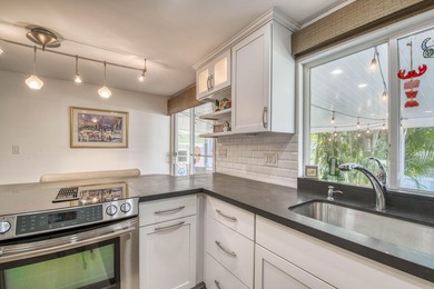 The most adorable place to call ''vacation home''! Walk in the on Jupiter Dunes Golf Course in Florida - for sale on GolfHomes.com, golf home, golf lot