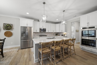 Welcome home to 125 Vast View Way, a beautifully designed on Olde Liberty Golf and Country Club in North Carolina - for sale on GolfHomes.com, golf home, golf lot