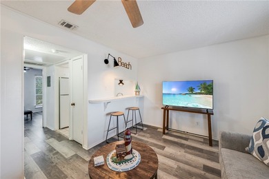 Get ready to live island life! This 2nd-floor condo at Mustang on Palmilla Beach Golf Club in Texas - for sale on GolfHomes.com, golf home, golf lot