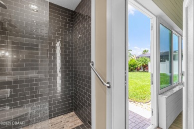 Indulge in the epitome of luxury living with this pristine on Venetian Bay Golf Course in Florida - for sale on GolfHomes.com, golf home, golf lot