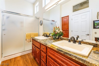 Beautifully maintained Sun City Summerlin gem on a PREMIUM on Highland Falls Golf Club in Nevada - for sale on GolfHomes.com, golf home, golf lot
