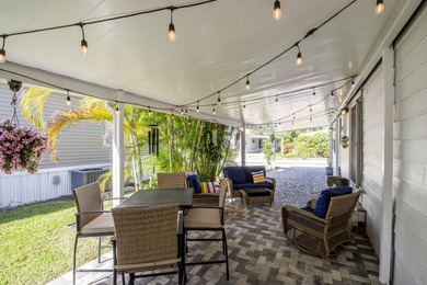 The most adorable place to call ''vacation home''! Walk in the on Jupiter Dunes Golf Course in Florida - for sale on GolfHomes.com, golf home, golf lot