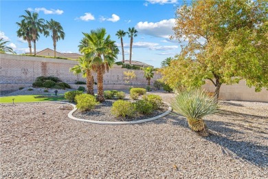 Beautifully maintained Sun City Summerlin gem on a PREMIUM on Highland Falls Golf Club in Nevada - for sale on GolfHomes.com, golf home, golf lot