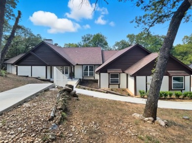 Stunning, updated multi-level home with pool on the East side of on Woodhaven Country Club in Texas - for sale on GolfHomes.com, golf home, golf lot