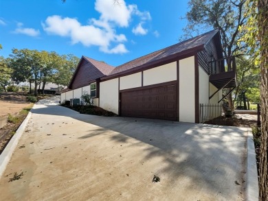 Stunning, updated multi-level home with pool on the East side of on Woodhaven Country Club in Texas - for sale on GolfHomes.com, golf home, golf lot