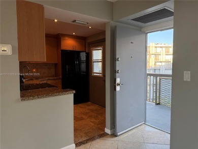 Experience practical living in this corner unit on the 6th floor on Turnberry Isle Resort and Club in Florida - for sale on GolfHomes.com, golf home, golf lot