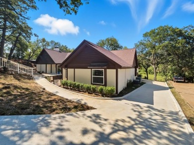 Stunning, updated multi-level home with pool on the East side of on Woodhaven Country Club in Texas - for sale on GolfHomes.com, golf home, golf lot