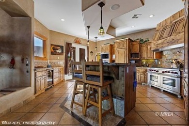 Commanding an elevated position above the city, this exceptional on Falcon Ridge Golf Course in Nevada - for sale on GolfHomes.com, golf home, golf lot