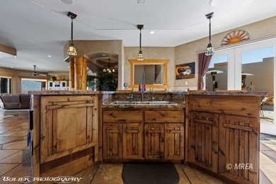 Commanding an elevated position above the city, this exceptional on Falcon Ridge Golf Course in Nevada - for sale on GolfHomes.com, golf home, golf lot