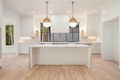 Set on a sprawling 1-acre lot in an established, tree-lined on Dunwoody Country Club in Georgia - for sale on GolfHomes.com, golf home, golf lot