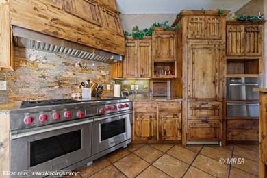 Commanding an elevated position above the city, this exceptional on Falcon Ridge Golf Course in Nevada - for sale on GolfHomes.com, golf home, golf lot