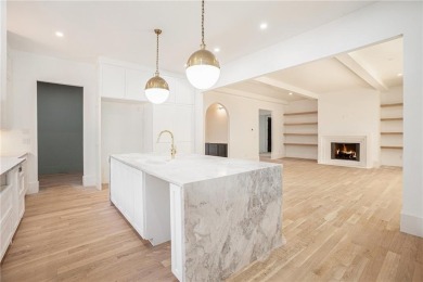 Set on a sprawling 1-acre lot in an established, tree-lined on Dunwoody Country Club in Georgia - for sale on GolfHomes.com, golf home, golf lot