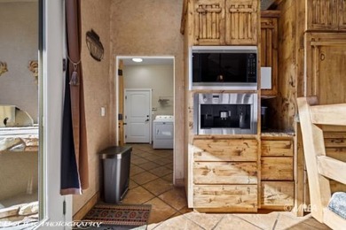 Commanding an elevated position above the city, this exceptional on Falcon Ridge Golf Course in Nevada - for sale on GolfHomes.com, golf home, golf lot