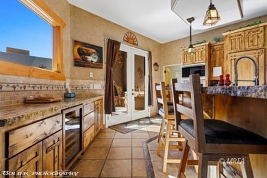 Commanding an elevated position above the city, this exceptional on Falcon Ridge Golf Course in Nevada - for sale on GolfHomes.com, golf home, golf lot