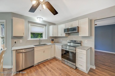 Luxury Living on Split Rock Golf Course with 2nd Hole Views on Split Rock Resort and Country Club in Pennsylvania - for sale on GolfHomes.com, golf home, golf lot