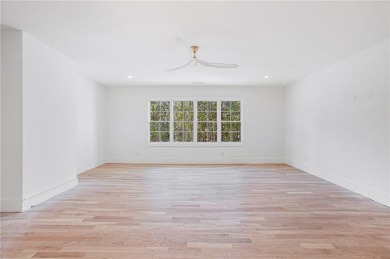 Set on a sprawling 1-acre lot in an established, tree-lined on Dunwoody Country Club in Georgia - for sale on GolfHomes.com, golf home, golf lot