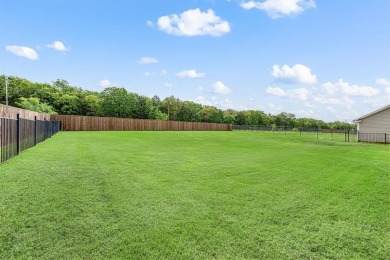 Welcome to this stunning custom-built home tucked inside the on Lake Kiowa Golf Course in Texas - for sale on GolfHomes.com, golf home, golf lot