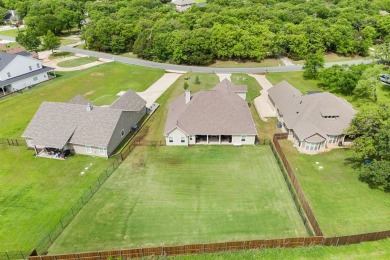 Welcome to this stunning custom-built home tucked inside the on Lake Kiowa Golf Course in Texas - for sale on GolfHomes.com, golf home, golf lot