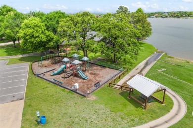 Welcome to this stunning custom-built home tucked inside the on Lake Kiowa Golf Course in Texas - for sale on GolfHomes.com, golf home, golf lot