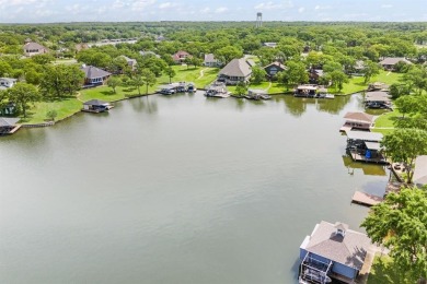 Welcome to this stunning custom-built home tucked inside the on Lake Kiowa Golf Course in Texas - for sale on GolfHomes.com, golf home, golf lot