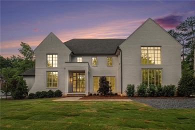 Set on a sprawling 1-acre lot in an established, tree-lined on Dunwoody Country Club in Georgia - for sale on GolfHomes.com, golf home, golf lot