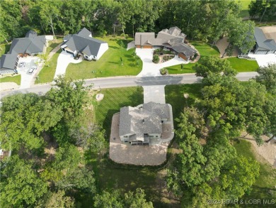 Price improvement! Infinity Homes, beautifully built home sits on Osage National Golf Club in Missouri - for sale on GolfHomes.com, golf home, golf lot