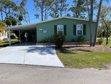 TIRED OF SNOW,ICE AND COLD, TRADE IT IN FOR SUN,WARM AND WHITE on Lake Fairways Country Club in Florida - for sale on GolfHomes.com, golf home, golf lot