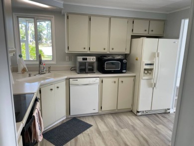 TIRED OF SNOW,ICE AND COLD, TRADE IT IN FOR SUN,WARM AND WHITE on Lake Fairways Country Club in Florida - for sale on GolfHomes.com, golf home, golf lot