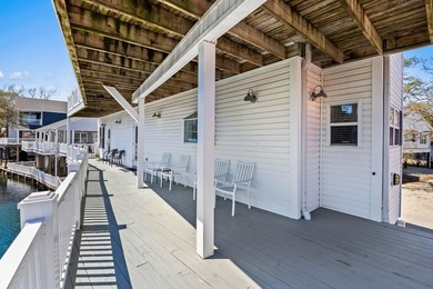 STUNNING 4 BED/4 BATH LAKEFRONT RAISED BEACH HOUSE WITH TONS OF on Prestwick Country Club in South Carolina - for sale on GolfHomes.com, golf home, golf lot