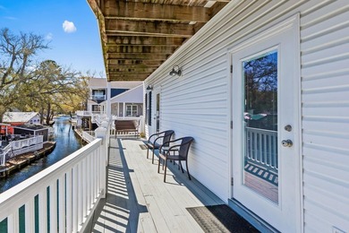 STUNNING 4 BED/4 BATH LAKEFRONT RAISED BEACH HOUSE WITH TONS OF on Prestwick Country Club in South Carolina - for sale on GolfHomes.com, golf home, golf lot