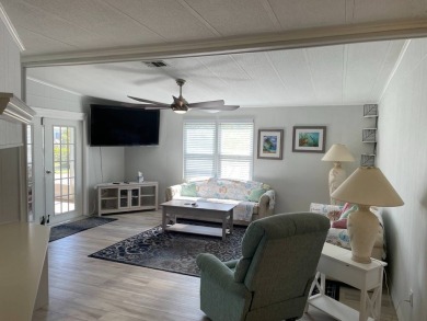 TIRED OF SNOW,ICE AND COLD, TRADE IT IN FOR SUN,WARM AND WHITE on Lake Fairways Country Club in Florida - for sale on GolfHomes.com, golf home, golf lot