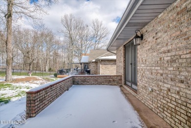 This distinguished all brick home sits on the 11th green of the on Druid Hills Golf Club in Tennessee - for sale on GolfHomes.com, golf home, golf lot