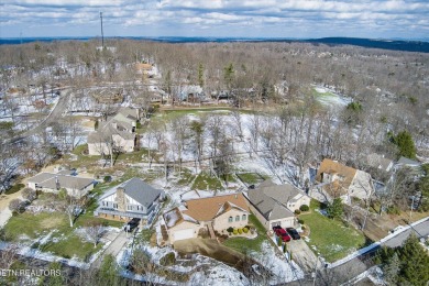 This distinguished all brick home sits on the 11th green of the on Druid Hills Golf Club in Tennessee - for sale on GolfHomes.com, golf home, golf lot