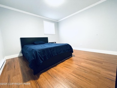 SHORT-TERM RENTALS FRIENDLY! FULLY FURNISHED! MOVE-IN READY! on Pocono Farms Country Club in Pennsylvania - for sale on GolfHomes.com, golf home, golf lot