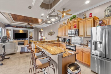 Enjoy the charm of this Italian villa-inspired, beautifully on Stoneybrook Golf Club At Heritage Harbour in Florida - for sale on GolfHomes.com, golf home, golf lot