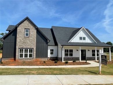 PRICED WELL BELOW MARKET! NEW CONSTRUCTION complete and ready to on Double Oaks Golf Club in Georgia - for sale on GolfHomes.com, golf home, golf lot