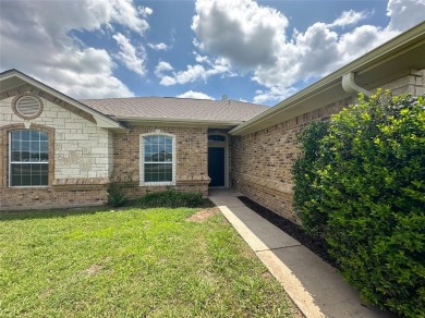 Beautiful custom 4BD 2BA home located just a golf cart ride away on Gatesville Country Club in Texas - for sale on GolfHomes.com, golf home, golf lot