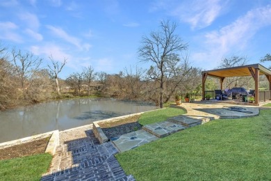 MOTIVATED SELLER! Welcome to your dream retreat in prestigious on Pecan Plantation Country Club in Texas - for sale on GolfHomes.com, golf home, golf lot