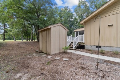 Huge Price Reduction! Fantastic one-level living backing up to on Duck Woods Country Club in North Carolina - for sale on GolfHomes.com, golf home, golf lot