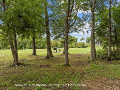 Huge Price Reduction! Fantastic one-level living backing up to on Duck Woods Country Club in North Carolina - for sale on GolfHomes.com, golf home, golf lot